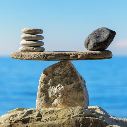 stones balancing representing the balance of hormones